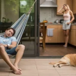 Father naps on shaded patio while wife cooks lunch inside Scottsdale home on hot summer day