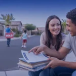 Couple reviewing paperwork in driveway of new home in Chandler Arizona subdivision