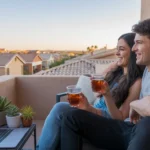 Couple planning their budget on an apartment patio in Scottsdale, Arizona