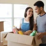 Couple unpacking groceries in new Chandler apartment kitchen