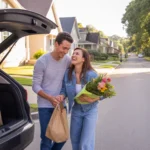 Couple unloading groceries outside their apartment in Westminster, Colorado