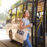 Woman boarding a DART bus in Irving, TX on a quiet morning