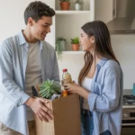 Couple unpacks groceries in modern Irvine apartment kitchen