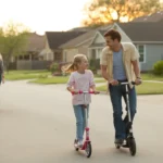 Father and daughter riding scooters together on a residential street in Pearland, TX at sunset