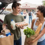 Two roommates divide up groceries from their weekly shopping trip outside a local supermarket in Round Rock, Texas.