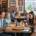 A young family enjoying pizza together at a cozy local restaurant in Sandy, Utah.